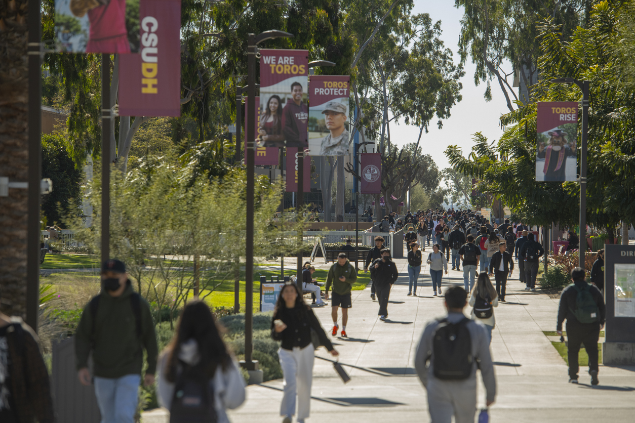 students walking on college campus