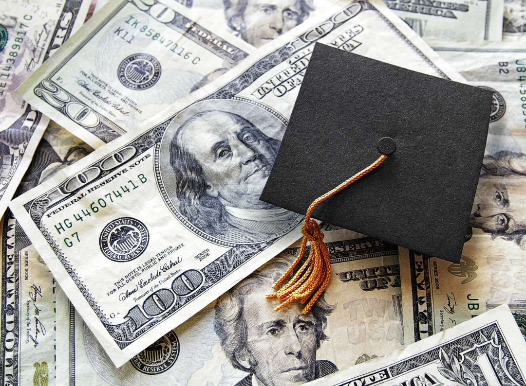 money and grad cap