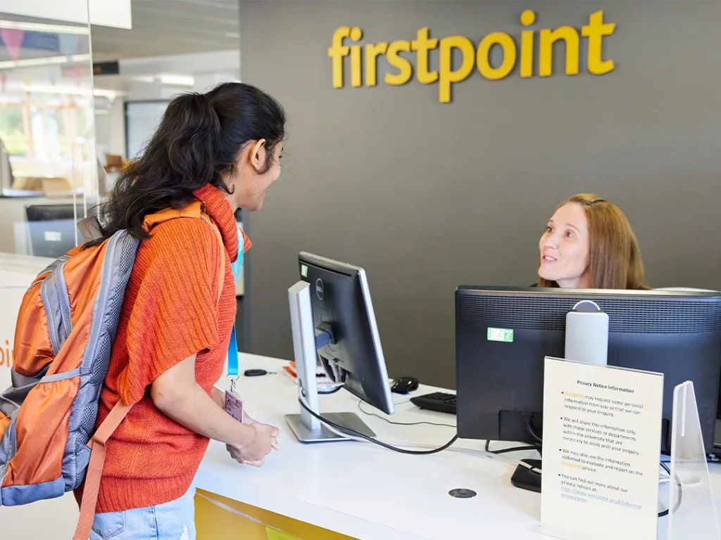 A student speaking to the Firstpoint reception
