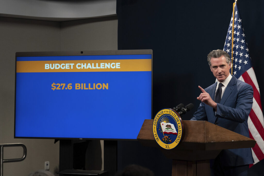Gov. Newsom, school groups settle funding fight, with some more money coming as IOUs