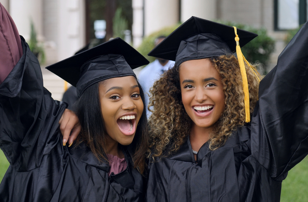 college grads in cap and gown