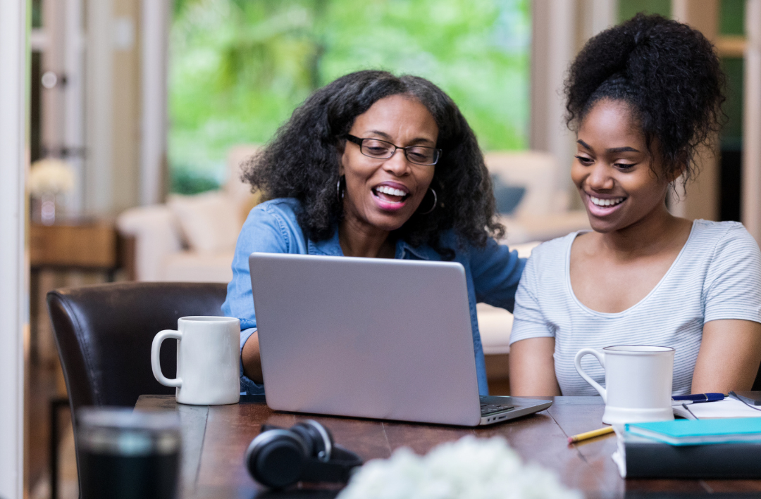 Mom and teen on laptop