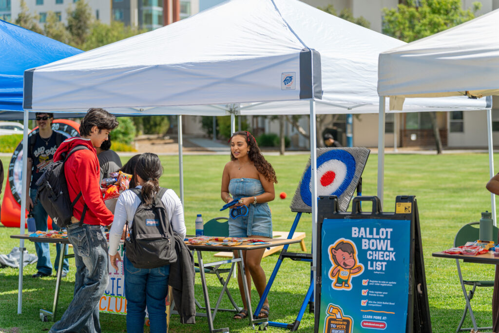 Turning out California student voters with quizzes, coffee sleeves and door-knocking