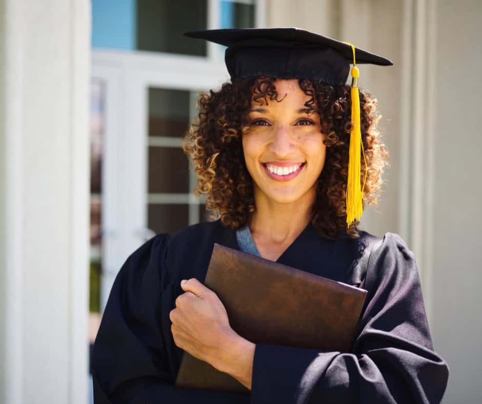 female graduate with diploma