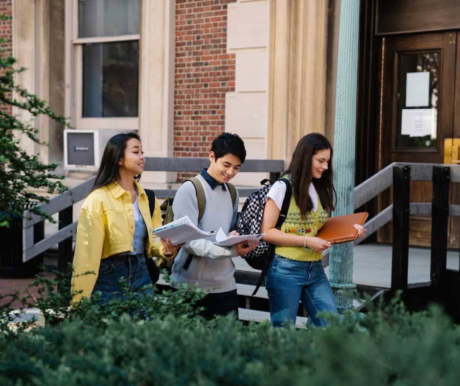 college students walking together