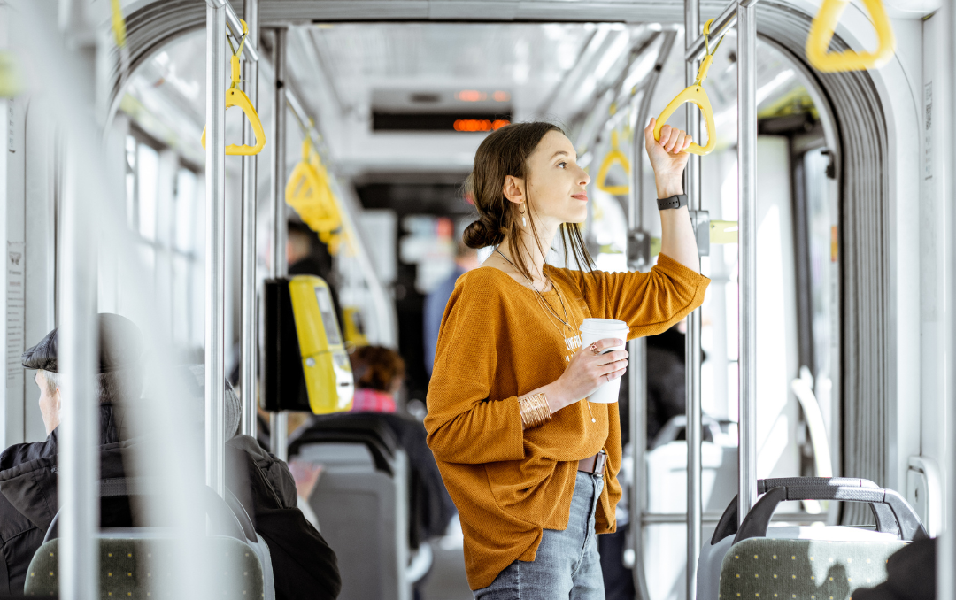 student riding public transit