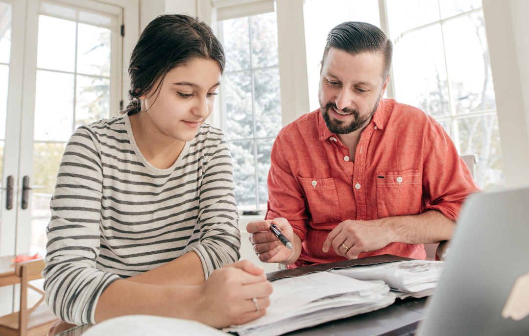 father and daughter strategize how to pay for college